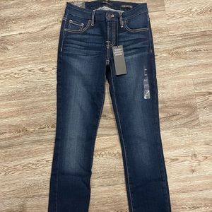 NWT guess power curvy mid-wash jeans. mid rise